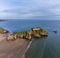 An aerial view towards Saint Catherines Island off the South beach in Tenby, Wales