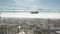 Aerial view of a tower crane boom on a construction site against the cityscape of Moscow, Russia