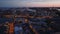 Aerial view of town development in urban borough at dusk. Modern structures at waterfront. Helsinki, Finland