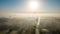 Aerial View of a Town Enveloped in Morning Mist