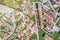 Aerial view town with houses and ceramic tiles, solar panels, streets