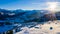 Aerial view of townwith snow covered roofs. Village in Switzerland in winter with a lot of snow