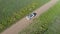 Aerial view of Toyota 4runner SUV driving slowly on a dirt road