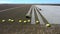 Aerial view of tractors harvesting cotton in the field in Goias, Brazil