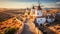 Aerial view of traditional medieval spanish windmills in Consuegra at sunset. Generative AI