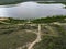 Aerial view of a tranquil lake situated in a remote, secluded area of natural beauty