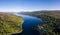 Aerial view of a tranquil Scottish loch in the early morning sunshine Loch Eil, Fort William