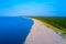 Aerial view  transparent turquoise sea in Baltic Sea.Summer seascapel, beach, beautiful waves, blue water at sunset. Top view from