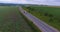 Aerial view. Transportation of combines on road tractors on the road. Oversized transportation. 4k