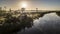 Aerial view on a tree silhouette and calm river reflection