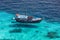 Aerial view of the tropical island, clear blue sea and a tourist