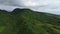 Aerial view of a tropical mountain in motion