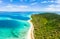Aerial view tropical paradise pristine beach rainforest blue lagoon bay coral reef caribbean sea turquoise water at Banyak Islands