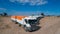 Aerial view of trucks prepared to load corn grains after harvest in the field.