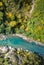 Aerial view of turquoise mountain river