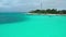 Aerial view on turquoise sea with port in Fulidhoo island on Maldives. Landscape seascape and concept travel vacation.