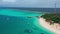 Aerial view on turquoise sea with port in Fulidhoo island on Maldives. Landscape seascape and concept travel vacation.