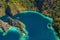 Aerial view of turquoise tropical lagoon with limestone cliffs in Coron Island, Palawan, Philippines. UNESCO World