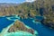 Aerial view of turquoise tropical lagoon with limestone cliffs in Coron Island, Palawan, Philippines. UNESCO World