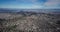 Aerial view Twin Peak mountains houses of San Francisco downtown and bay