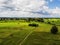 Aerial view of twins palm tree from Tay Ninh province of Vietnam country and rice field with a beautiful mountain