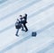 Aerial view of two businessmen fighting each other of the sidewalk