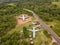 Aerial view of two discarded aircraft on a private lot. The plots around the aircraft are for sale.