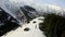 Aerial view of Two Mountaineers walking by skitour to Mountain peak