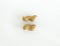 Aerial view of two natural peanuts in shells on white background. Organic dried fruits for a healthy diet and ideal for peanut