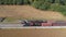 An Aerial View of Two Norfolk and Western Steam Locomotives Steaming Up on Two Tracks in the Countryside