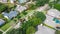 Aerial view a typical established residential neighborhood with matured trees in suburbs Dallas, Texas, USA