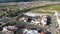 Aerial view of typical small town shopping center with parking . California