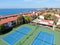 Aerial view of typical south california community condo with tennis court