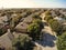 Aerial view typical Texas residential neighborhood in autumn wit