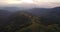 Aerial View Ukraine. Sunevyr. Flight over the Mountains. Flying over the Trees. Forest Valley. Sunset day. 4K resolution
