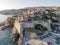 Aerial view of Ulcinj, a small town on a rocky promontory along the Mediterranean coastline in Montenegro during sunset