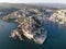 Aerial view of Ulcinj, a small town on a rocky promontory along the Mediterranean coastline in Montenegro during sunset