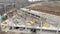 Aerial view unfinished construction site. Workers are working on construction
