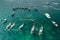 Aerial view of unidentified tourists snorkeling activity at Jabang pinnacle, Lipe Island, Thailand.