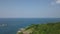 Aerial View of Uninhabited Tropical Island with Rocky Sea Shore