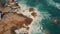 Aerial view of unknown people fishing at rocky Mediterranean seaside in Spain