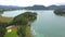 Aerial view on the upper ends of Ossiacher Lake in Carinthia, Austria on a summer day with great cloudscape