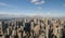 Aerial View of Upper Manhattan on a clear sunny day, Central Park visible in the distance