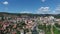 Aerial View of Uzice City, Serbia. River Beach and Scenic Cityscape in Valley