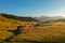 Aerial view of the valley in the fog during dawn in the Alpe di Suisi region. Dolomites in Italy in the fall