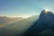 Aerial view of the valley in the fog during dawn in the Alpe di Suisi region. Dolomites in Italy in the fall