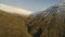 Aerial View of a Valley in Scotland with Forests