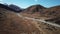 Aerial View of Vehicle on Countryside Road in Valley, Southern Alps, New Zealand