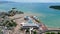 Aerial view of vehicles and passengers queueing to enter the ferry ship at the Merak Seaport. Banten, Indonesia, February 26, 2022