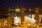 Aerial view of venetian columns, National Art Museum and Placa Espanya in Barcelona at night, Catalonia, Spain